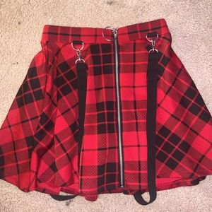 Black and red plaid skirt with suspenders
